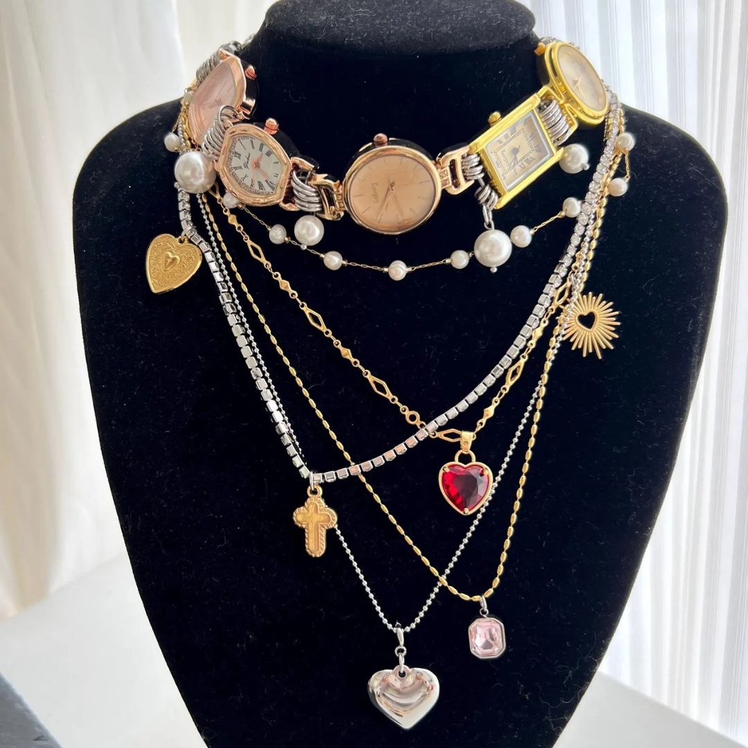 Layered vintage watch necklace with charms and pearls by MoJoneVintageJewelry