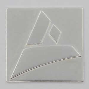 Casted sample of the Castimize logo in natural silver