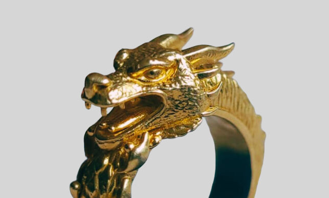 Zoomed side view of final casted Tripo AI dragon ring in brass